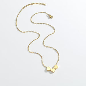 Minimalist Sleek Stainless Steel Pierced Heart Necklace With A Niche Designer Aesthetic For Women