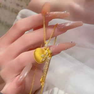Diamond-studded Bowknot Lucky Bag Tassel Coin Necklace